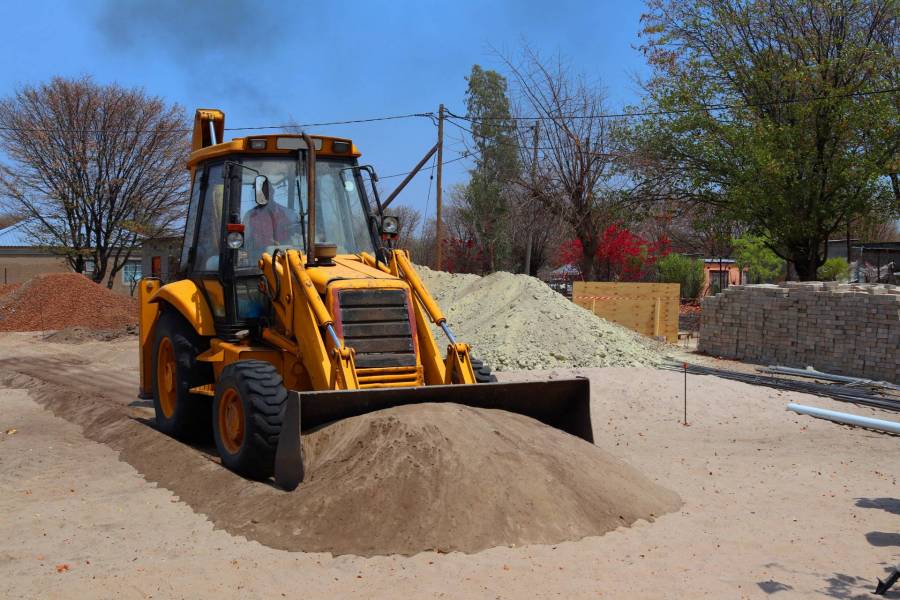 man operating a bulldozer on site