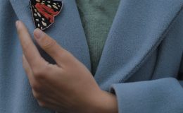 The new Humane AI pin, about the size of a lapel pin