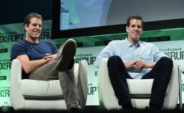 Tyler and Cameron Winklevoss on stage in 2015.
