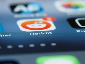 Reddit appears on a smartphone with notifications