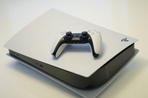 Sony Playstation 5 with controller on white background