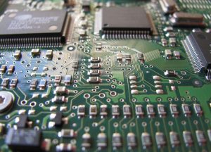 Image of a computer motherboard with chips visible.