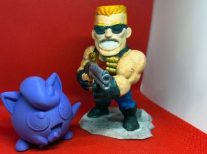 An image of Duke Nukem and Jigglypuff 3D printed models