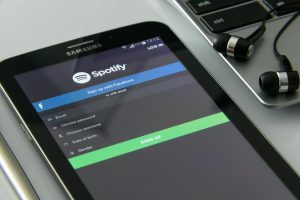 Image of Spotify login screen on smartphone. The streaming giant has attacked Apple's "outrageous" commission decision.