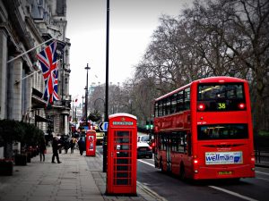 Image of London buses and red phone box on London street / BetMGM heralds big splash into UK market