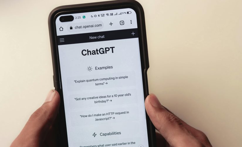 An image showing a mobile phone screen with OpenAI's ChatGPT app on screen.