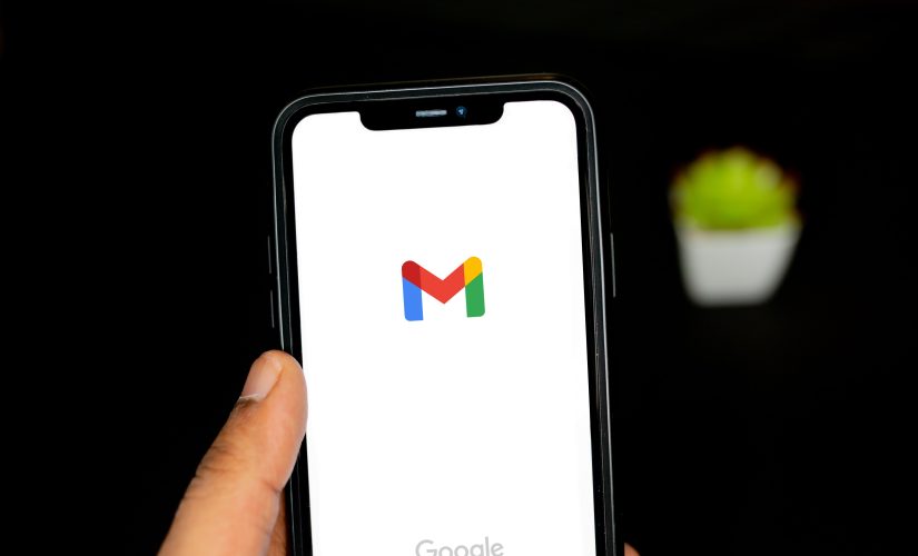 An image of a person accessing Gmail on an Android phone