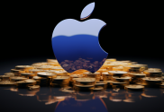 An image of a reflective Apple Inc logo atop a pile of gold coins.
