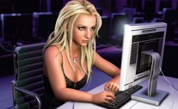 An AI-generated image of Britney Spears sat at a PC.