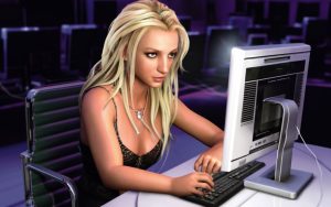 An AI-generated image of Britney Spears sat at a PC.