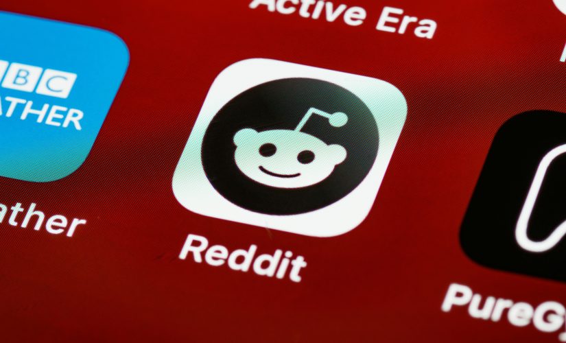Reddit logo displayed on phone