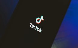 TikTok logo on a smartphone / TIkTok faces EU investigation over failure to protect children