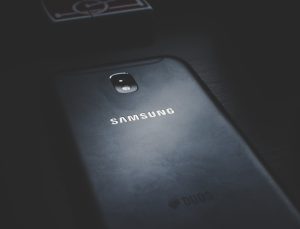 An image of a black Samsung phone face down