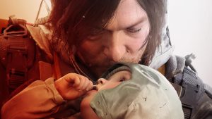 Sam and a baby in Death Stranding 2