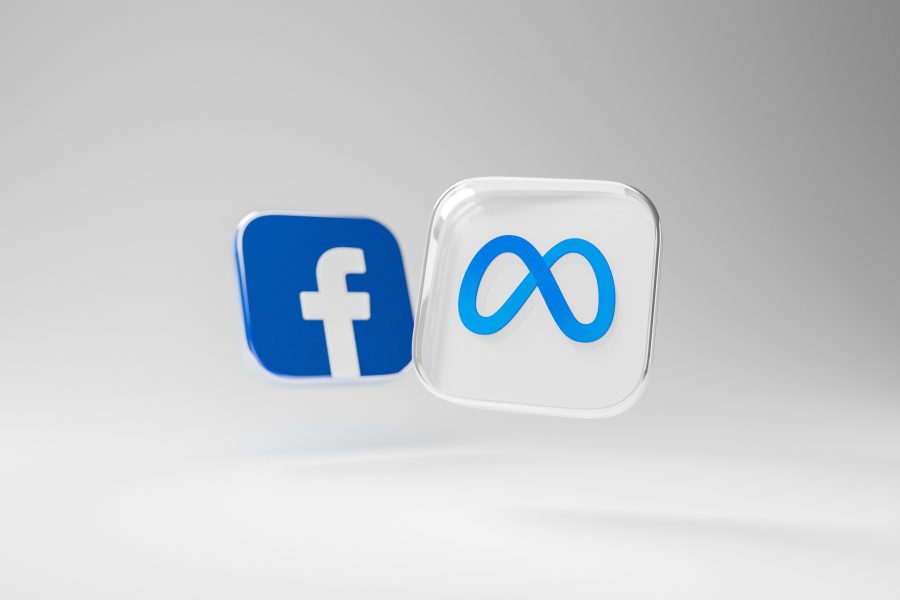 two square tiles showing the meta and facebook logos
