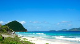 Sandy beach with mountain in the background, British Virgin Islands