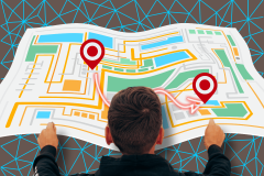 Google Maps may expand generative AI feature to everyone. A man examining a large, colorful city map with red location markers on a table.