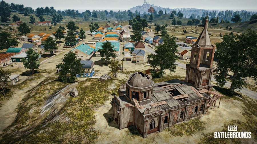 Erangel, PUBG's original map, presented as Erangel Classic in the game. The ruins of a church atop a hill are in the foreground.