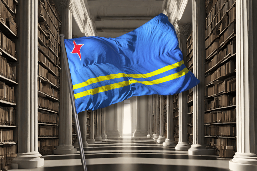 Internet Archive now official custodian of Aruba's entire history. A flag of Aruba waving inside a grand library with towering bookshelves lining a corridor.