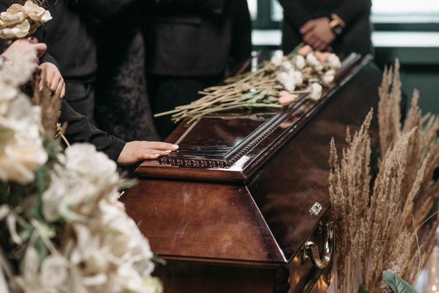 coffin and dried flowers funeral industry