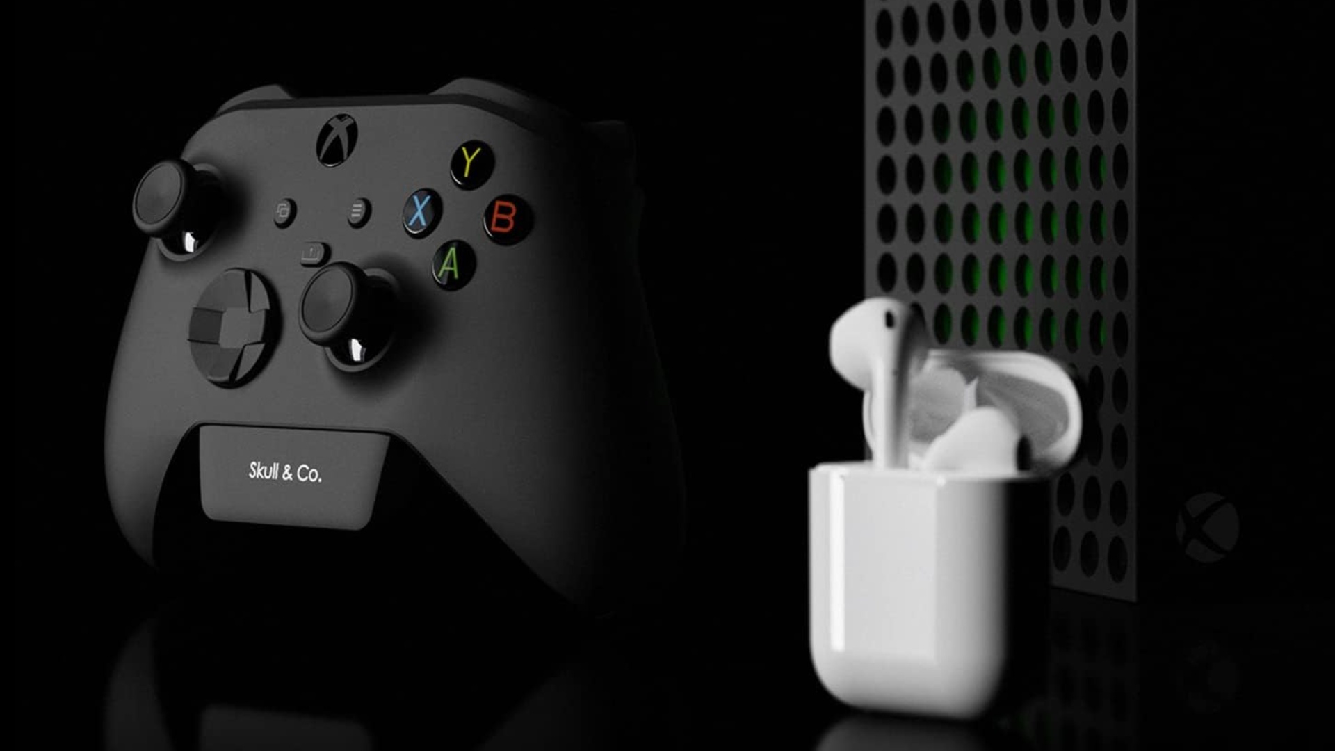 The Skull&Co Bluetooth adapter with AirPods and an Xbox Series X