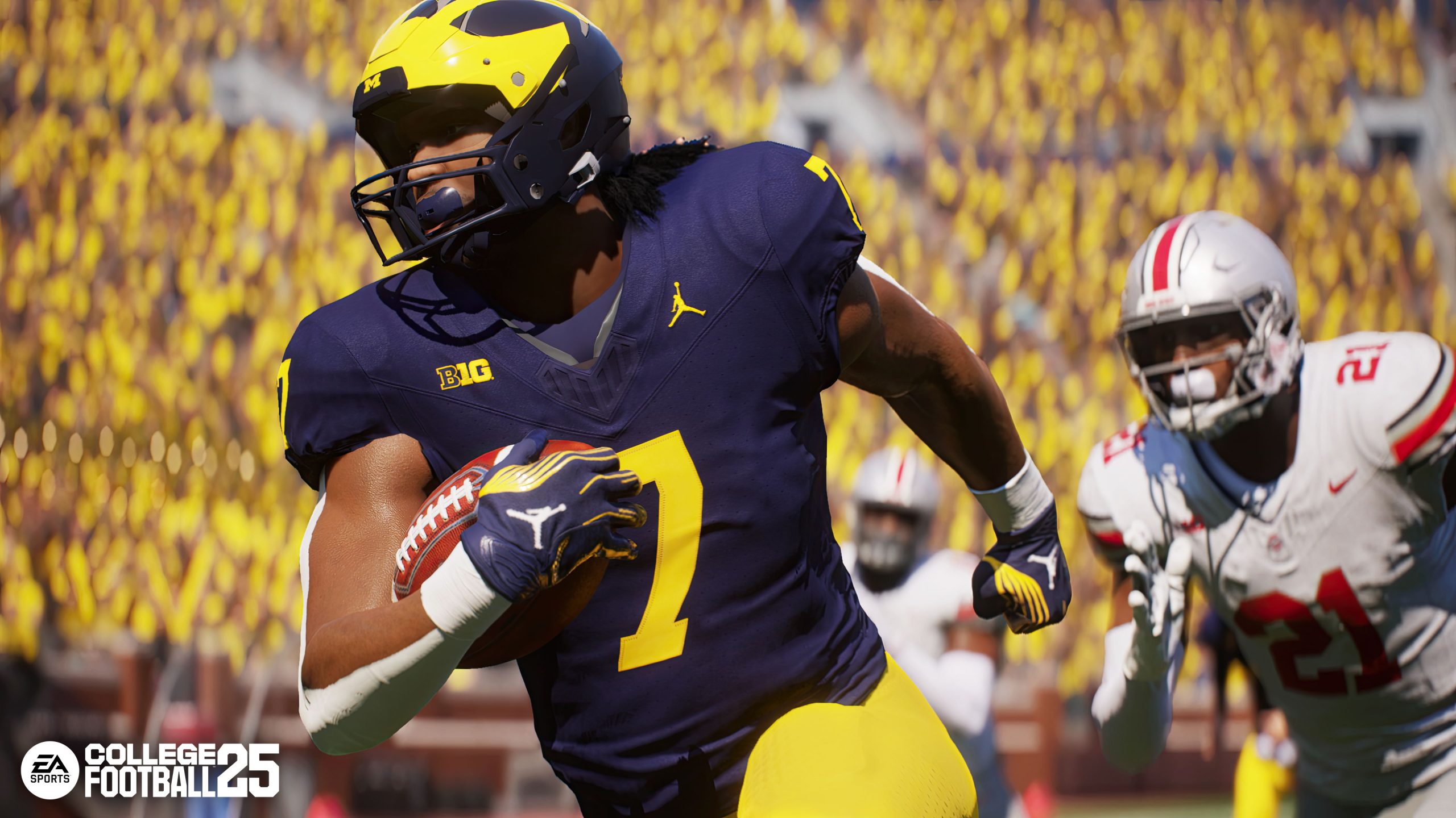 A Michigan football player, with the football tucked in his right elbow, runs ahead of the Ohio State defense at Michigan Stadium in EA Sports College Football 25