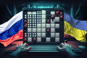 Hackers launch attacks using spoofed Minesweeper game in U.S. and Europe. The image depicts a dramatic scene with a computer screen displaying a spoofed version of the Minesweeper game, where traditional mines are replaced by spherical bombs. In the background, the flags of Russia and Ukraine overlap, symbolizing the geopolitical tension referenced in the context of cyberattacks. The setting is dark and atmospheric, with a cyberpunk cityscape in the background, enhancing the theme of cyber warfare. Hands are shown typing on a keyboard, suggesting the active involvement of a hacker in this scenario.