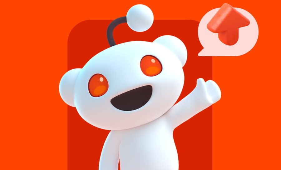 reddit's trademark cartoon alien waves hello to the viewer in this official brand image
