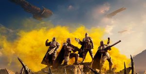Cover image of Helldivers 2. Four futuristic soldiers stand atop a pile of rubble with explosive fire behind them