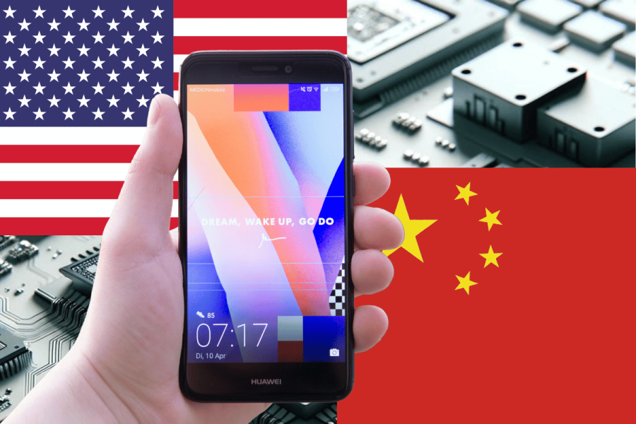 U.S. revokes Intel and Qualcomm chip licenses to supply China's Huawei. The image depicts a hand holding a smartphone against a split background of the United States flag on the left and the Chinese flag on the right. In the background, semiconductor chips can be seen, symbolizing the technological and trade tensions between the U.S. and China involving companies like Huawei.
