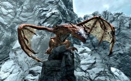 A Skyrim dragon perches on a rock