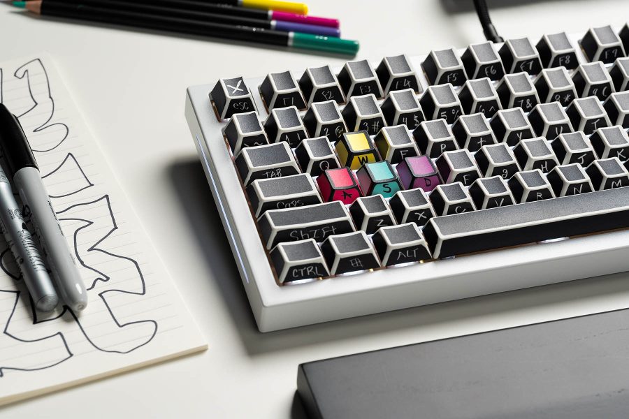 A keyboard with Glorious' Sketch keycaps on it.