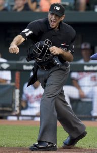 Pat Hoberg signalling an out call at the home plate