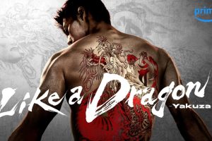 Key art for Like a Dragon: Yakuza. Kazuma Kiryu is facing away from the camera to show the huge dragon tattoo on his back.