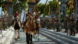 In a scene from Dragon Age Inquisition, three mounted riders, one leading the other two, make a processional before armored soldiers