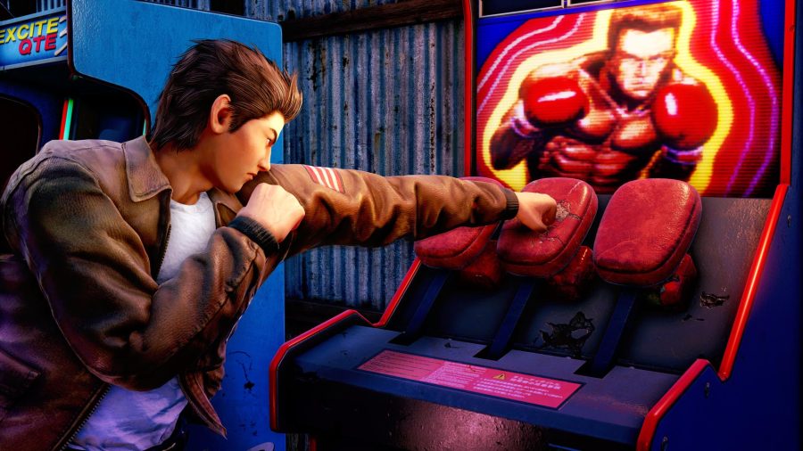 Shenmue 3 hero Ryo Hazuki punches an arcade boxing game in one of several minigames offered by Shenmue 3, the cult-hit sequel to 2001's Shenmue 2