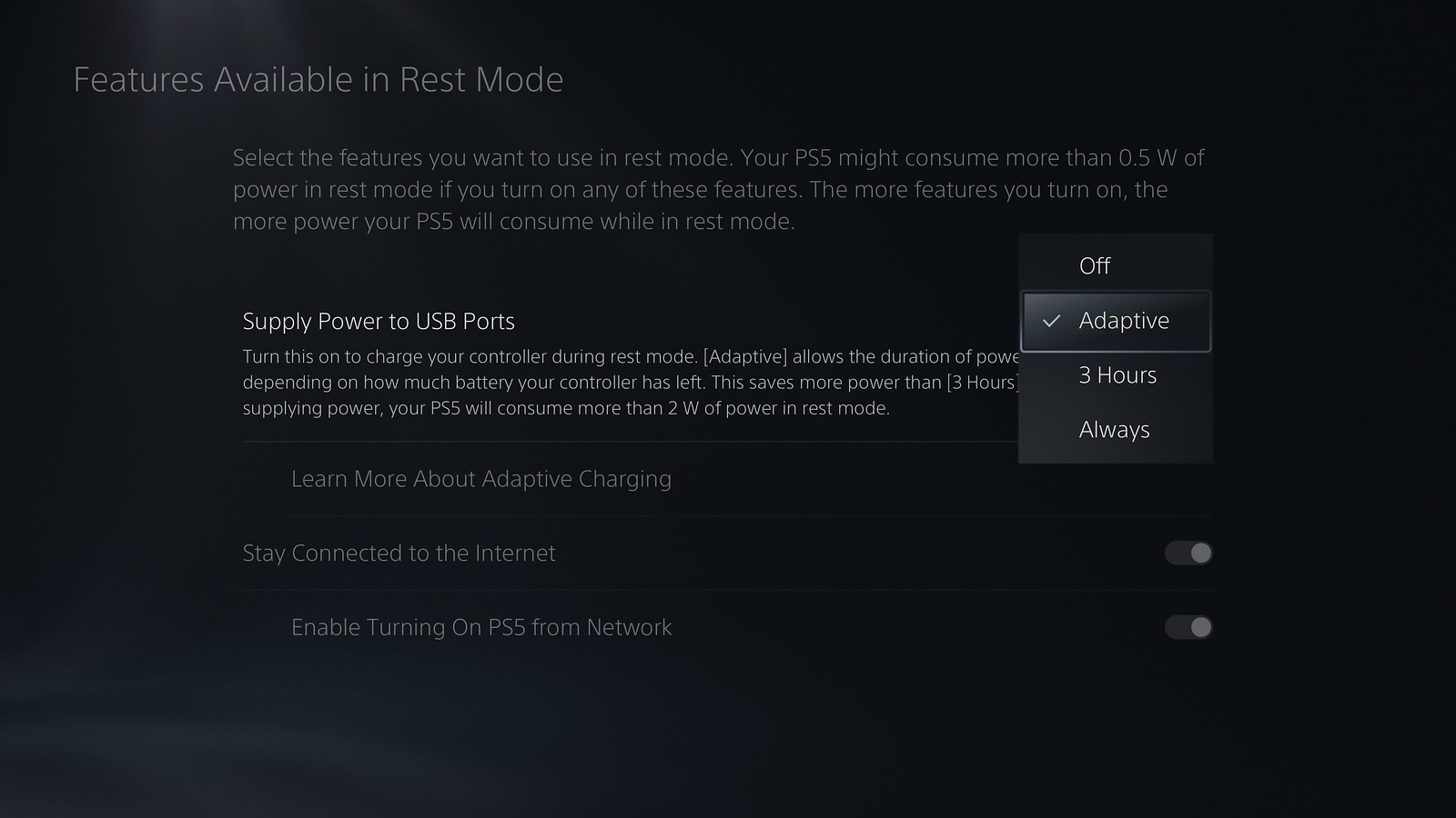 The menu shows "Features Available in Rest Mode," where users can configure the power supply to USB ports with options like "Off," "Adaptive," and "3 Hours." The screen highlights how each setting affects power consumption, with an option to learn more about Adaptive Charging. This is part of PS5's beta program.