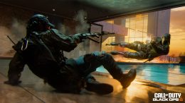 two players dive in opposite directions of each other firing assault weapons in a scene from Call of Duty: Black Ops 6, demonstrating the game's new Omnimovement system