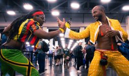 Two Cosplayers pose for a fighting game photo