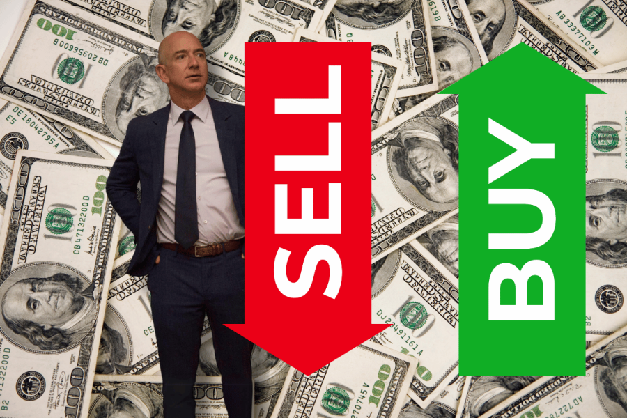 Jeff Bezos plans to sell $5B in Amazon shares. The image features Jeff Bezos standing with a confident pose on a backdrop of numerous hundred-dollar bills. Large red and green arrows, labeled "SELL" and "BUY" respectively, flank him on each side, symbolizing the financial transactions related to his plans to sell a significant amount of Amazon shares.