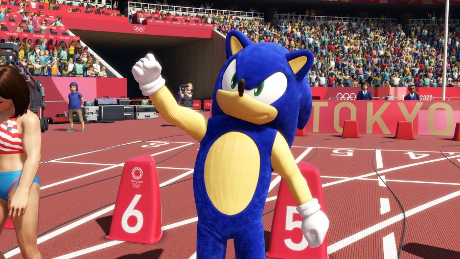 Sonic the Hedgehog raises a fist in celebration at a track and field event in the Tokyo 2020 Olympic Games video game Sega published in 2021