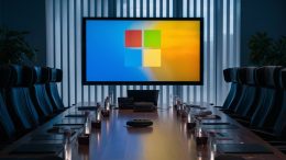 the microsoft logo on a TV screen within an empty office boardroom, cinematic