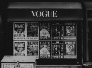 Vogue stand with several Conde Nast magazines displayed.