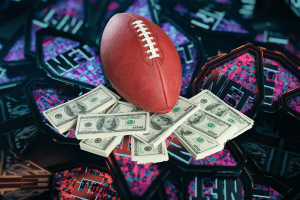 NFLPA sues DraftKings for $65M over alleged breached NFT contract. American football surrounded by money with a background of NFT tokens