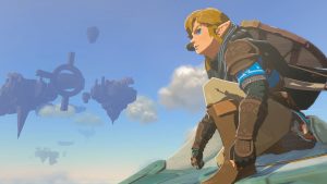 The legend of zelda's hero Link perched on a cliff, looking to the left of frame, in Legend of Zelda: Tears of the Kingdom