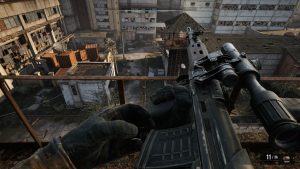  Heart of Chornobyl, the player is on a rooftop looking down at a courtyard below while he reloads a sniper rifle