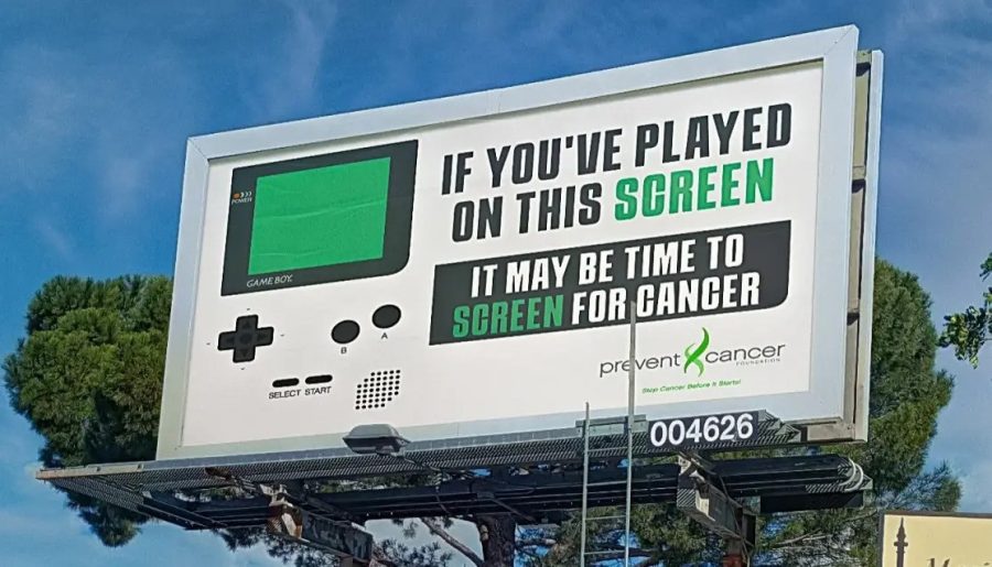 The cancer charity billboard featuring a Game Boy