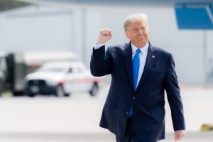 Donald Trump gestures with a fist pump