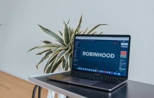 A laptop with the Robinhood trading platform on screen