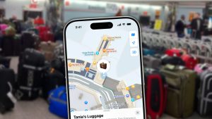 an iphone with the new luggage tracking on top of an image of airport luggage